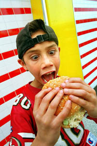 Kid Eating Hamburger