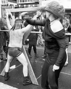 Maureen whipping someone