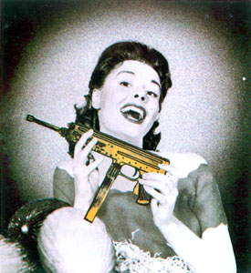 Woman holding gun